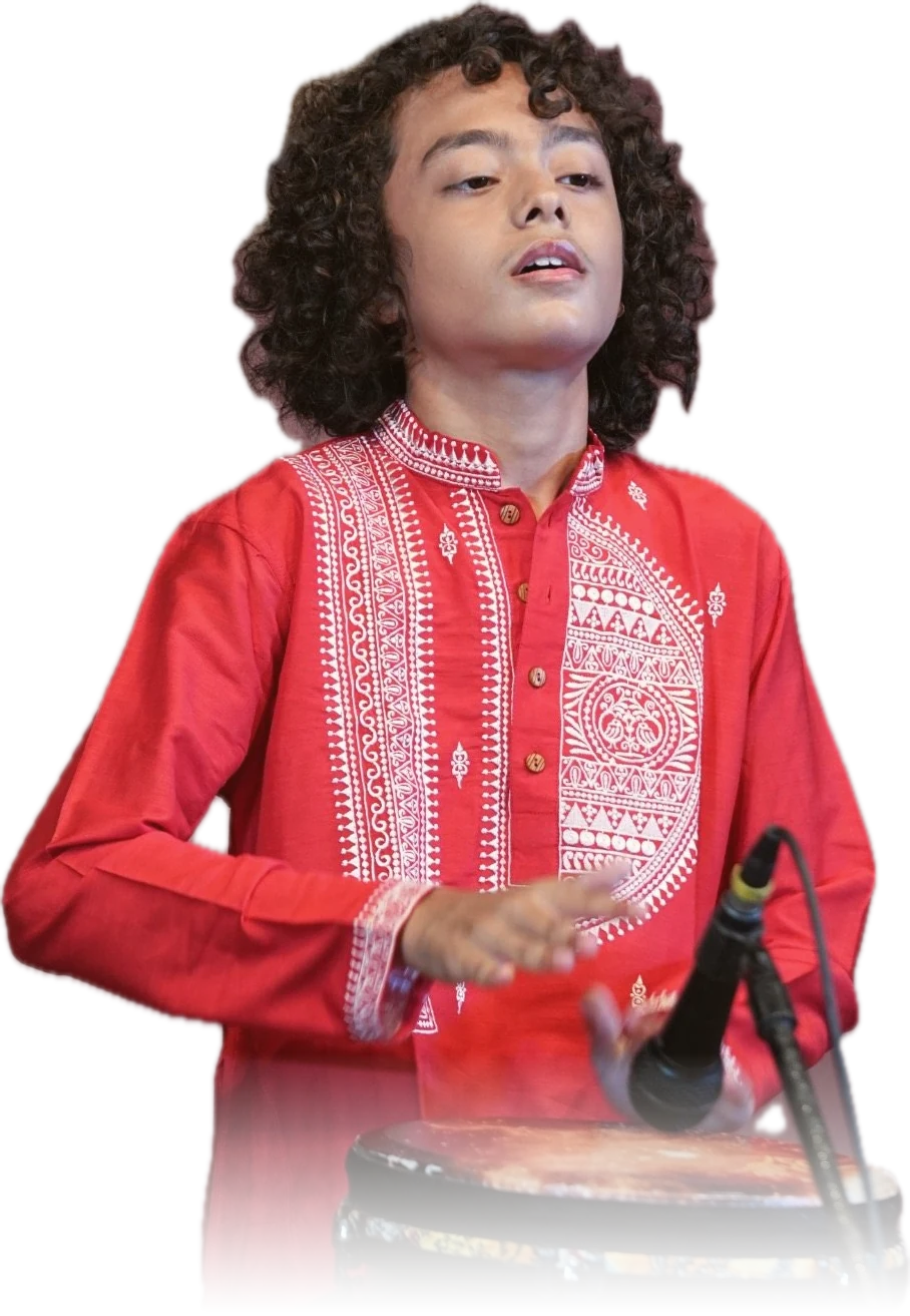 Aurum playing the djembe