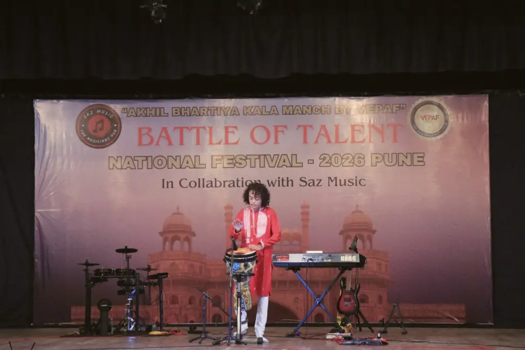 Wide view of Aurum performing on a large stage